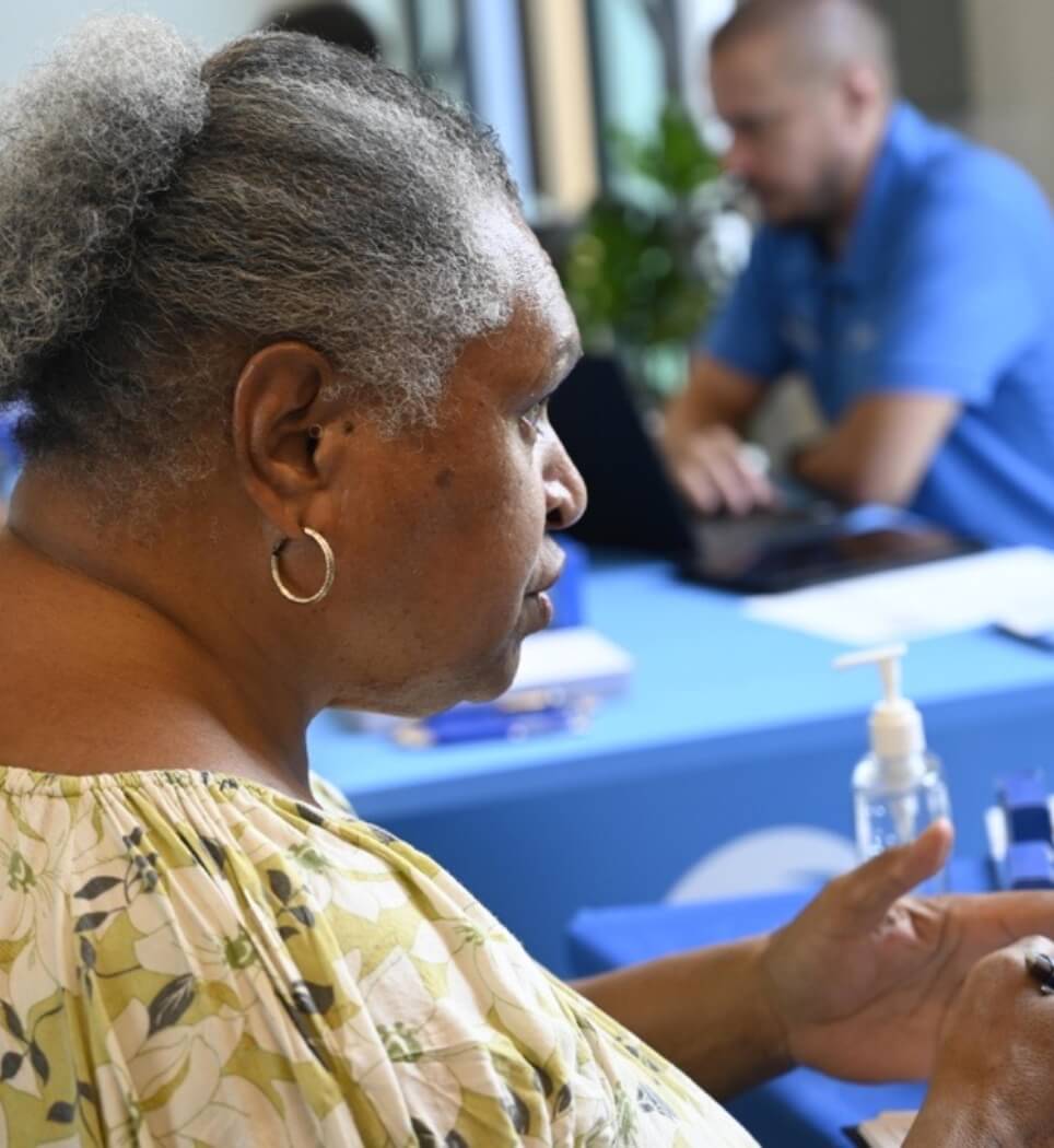 Aboriginal women sitting at desks