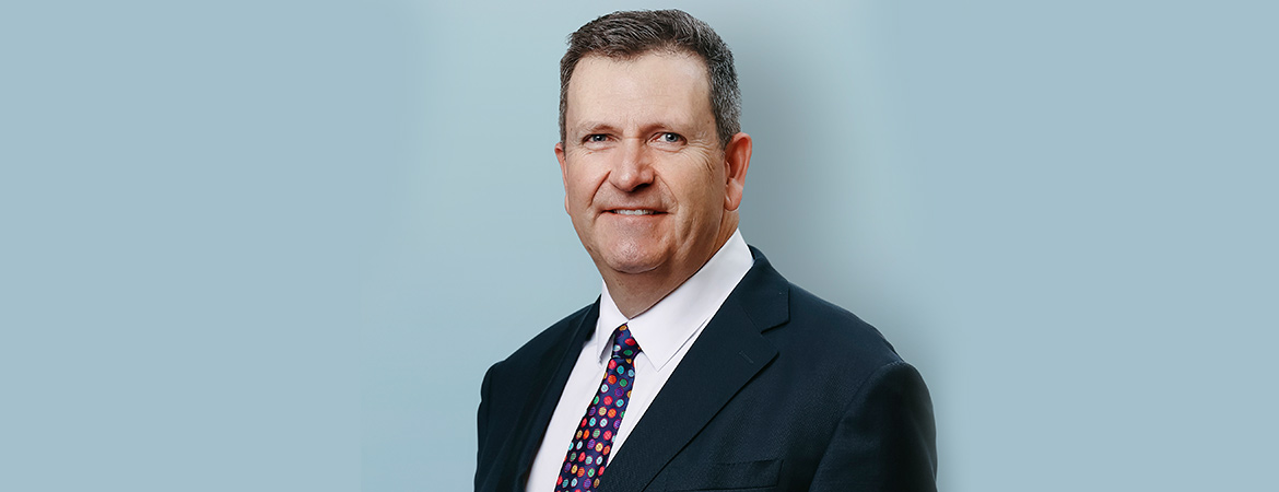 Lady browsing on computer with coffee