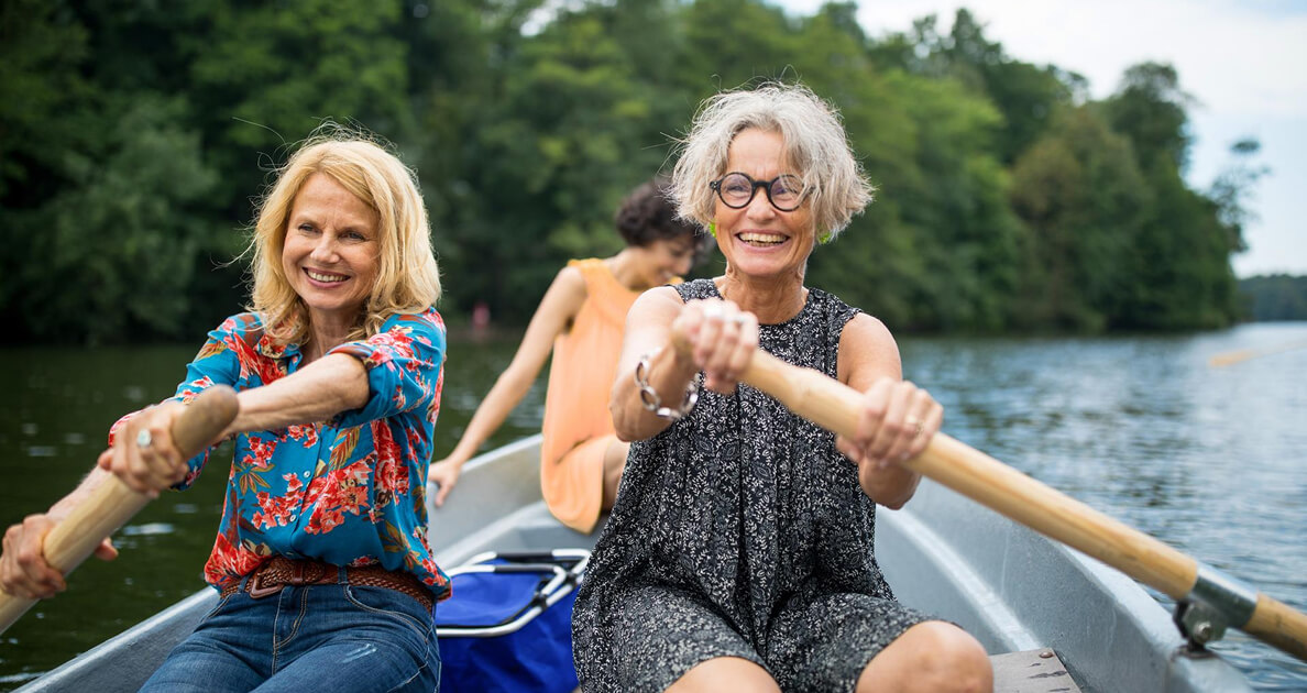 Group of women rowing on a river