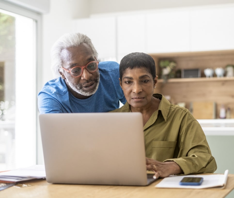 Couple working on a laptop