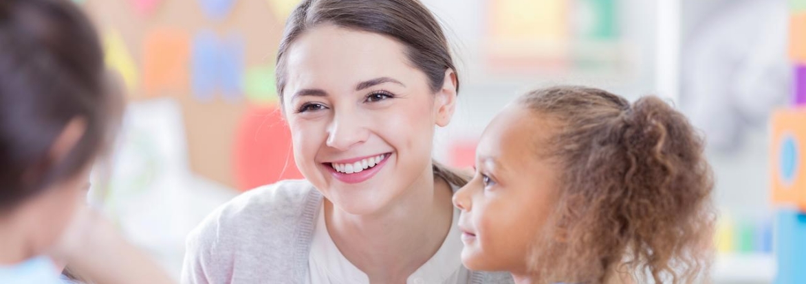 Lady in a childcare with child